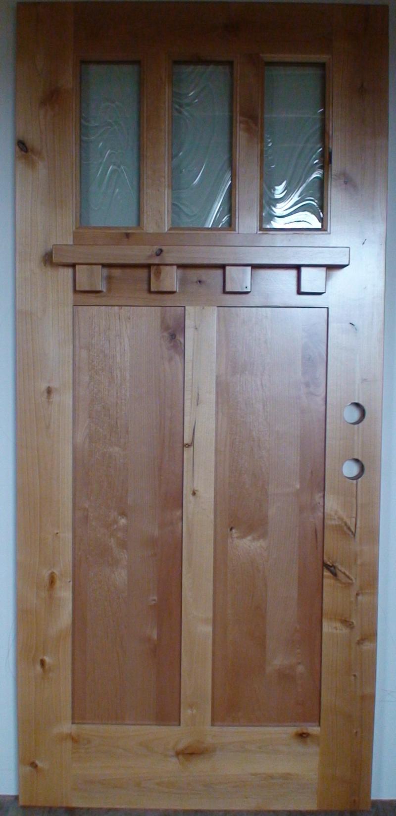 Knotty alder flat panels with shelf on exterior